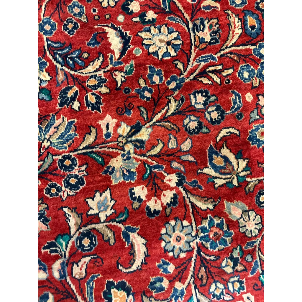 Vibrant 1950s Persian Mahal rug with red floral patterns