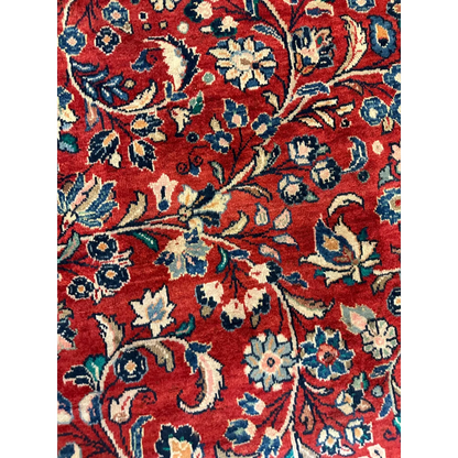 Vibrant 1950s Persian Mahal rug with red floral patterns