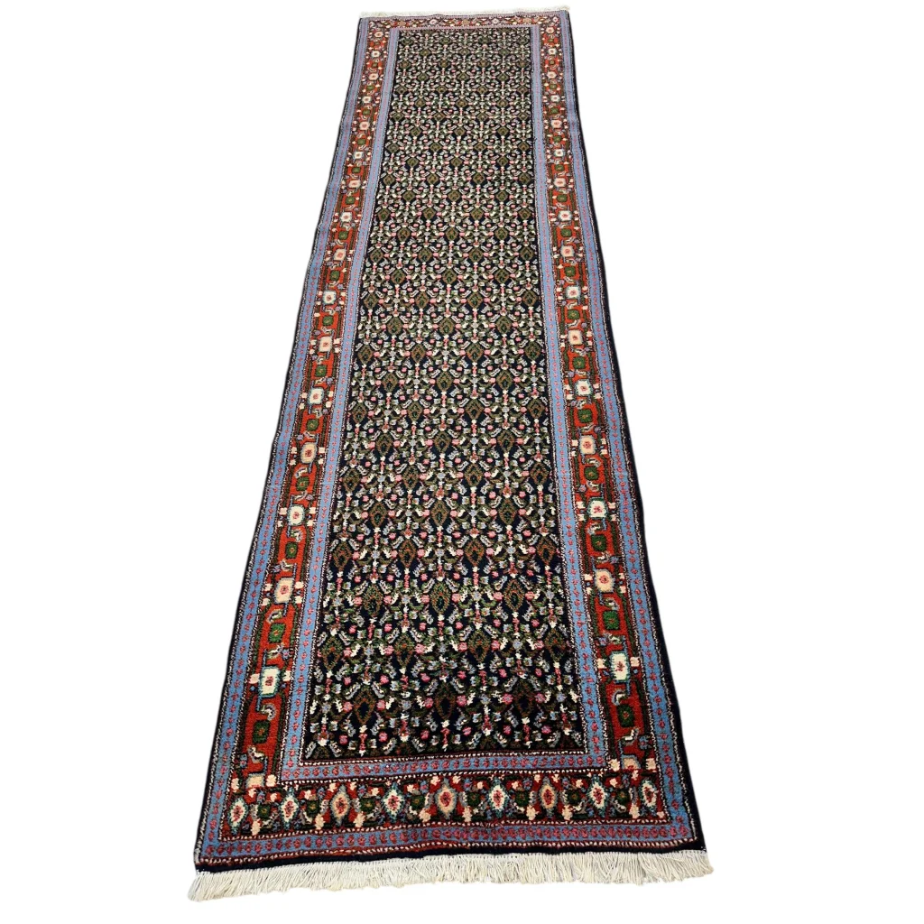 Vintage 1960s Persian Senneh runner rug with vibrant floral motifs