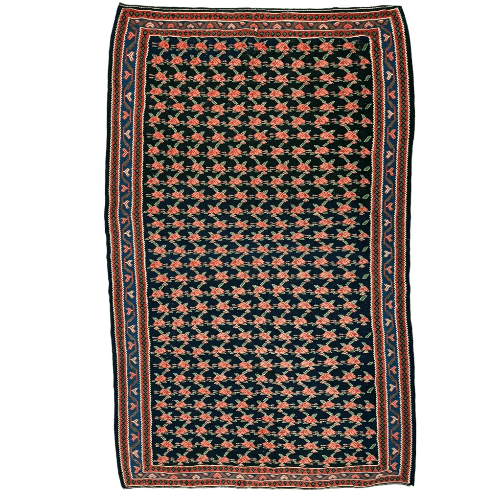Vintage 1950s Senneh Persian runner with coral rose garden design on dark navy ground
