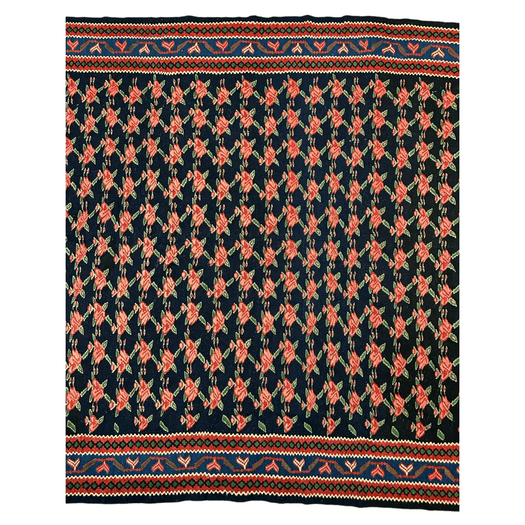 Vintage 1950s Persian Senneh runner with coral and rose floral motifs on deep blue background
