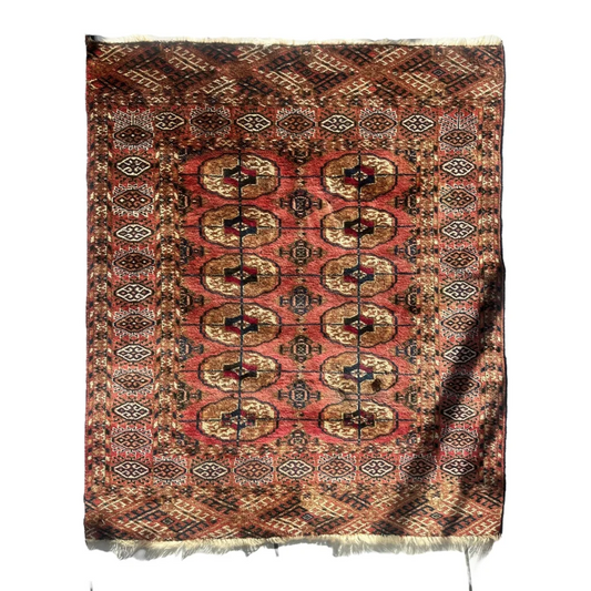 Stunning vintage Turkmen Persian rug with bold red medallions
