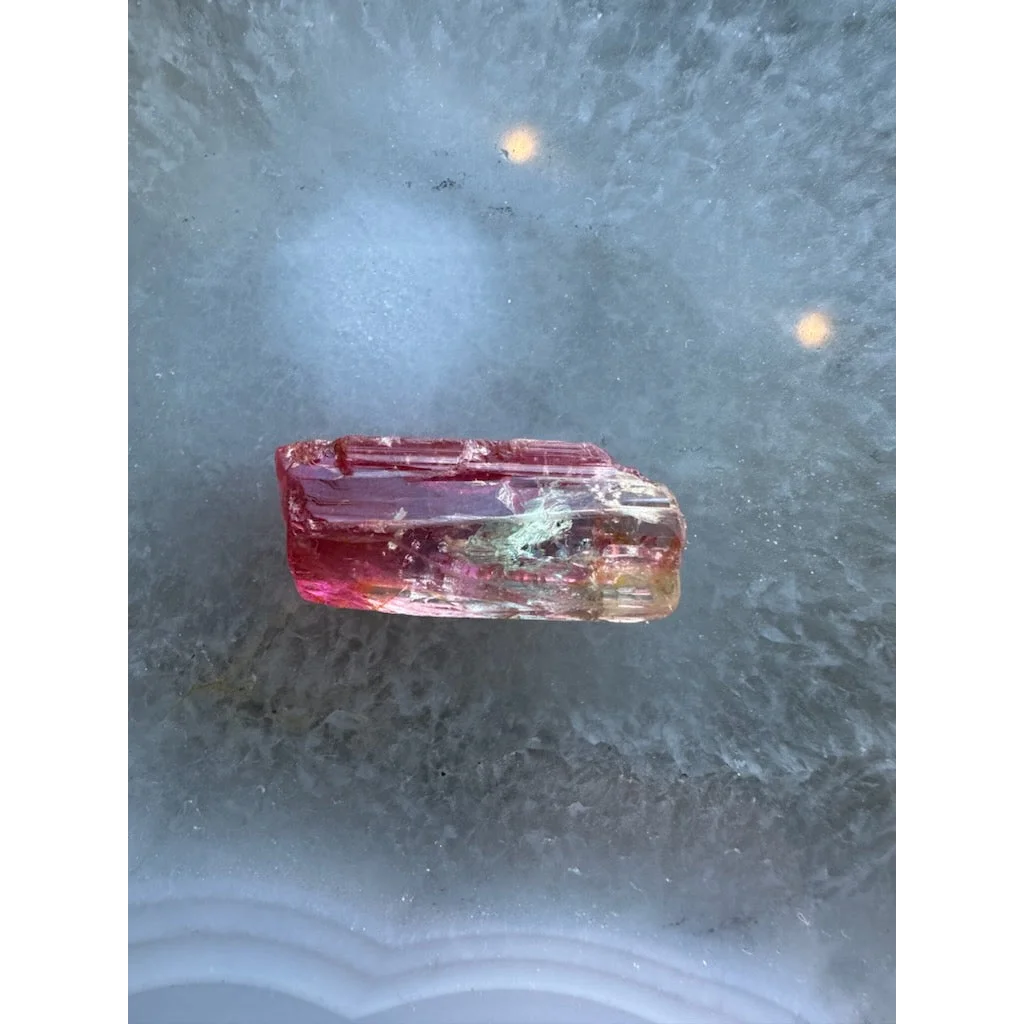 Vibrant watermelon tourmaline crystal from Brazil with pink to orange-red hues