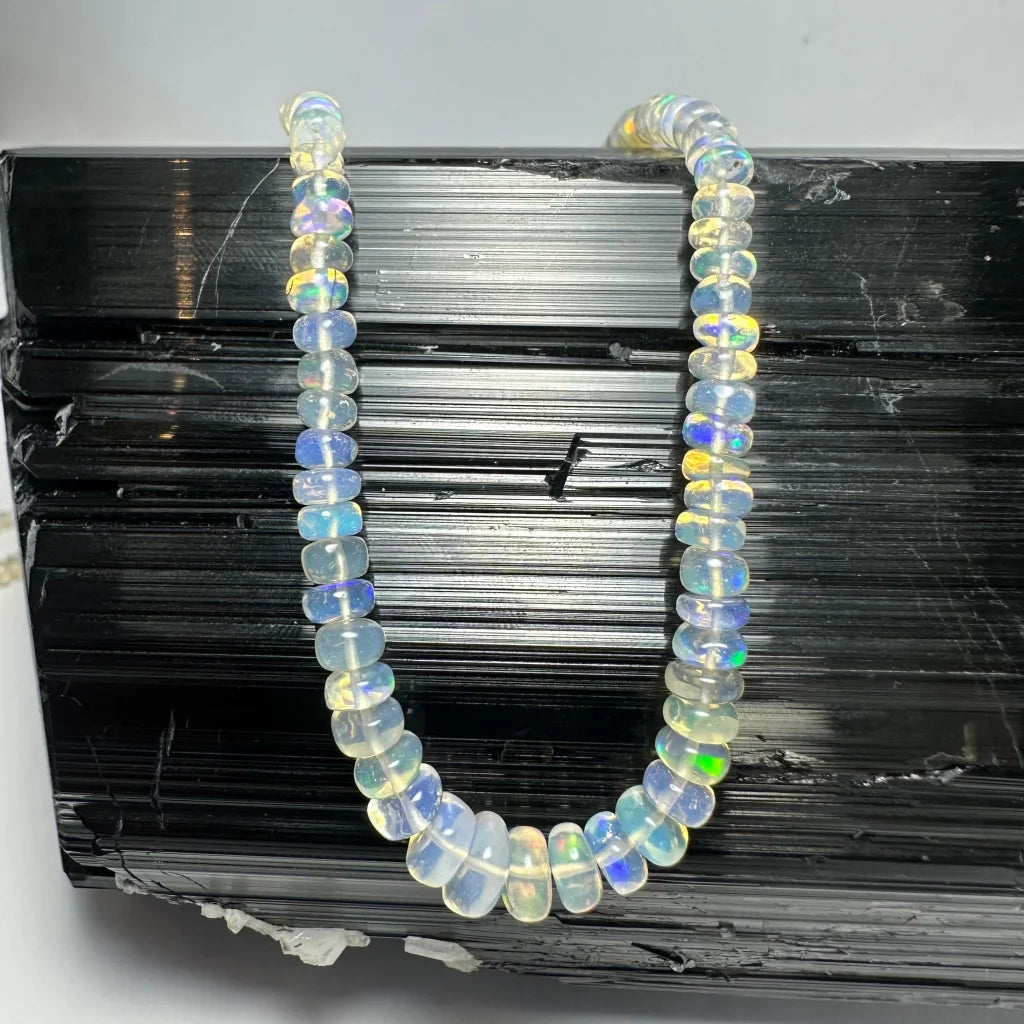 Stunning Welo opal graduated bead necklace with shimmering colors