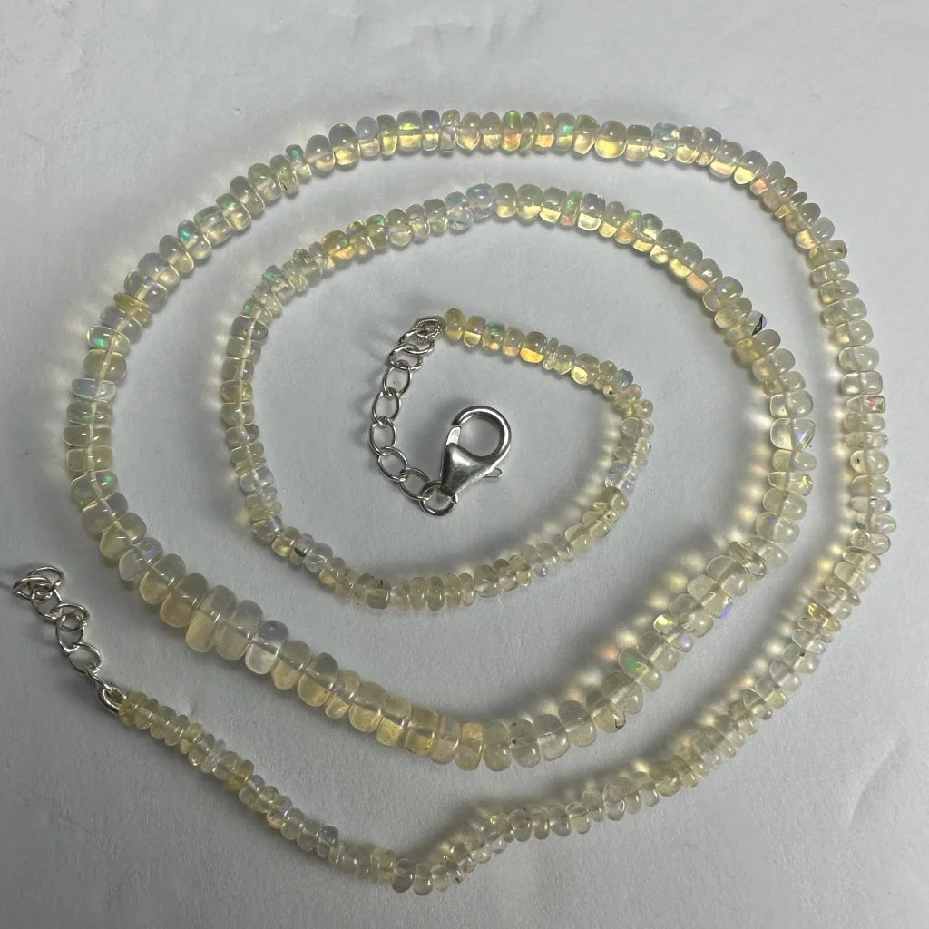 Stunning Welo opal graduated bead necklace with silver clasp