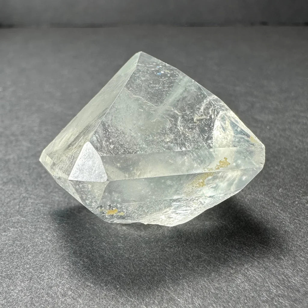 Stunning white topaz crystal from Namibia with golden glow