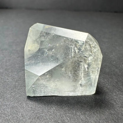 Stunning white topaz crystal from Namibia with golden glow