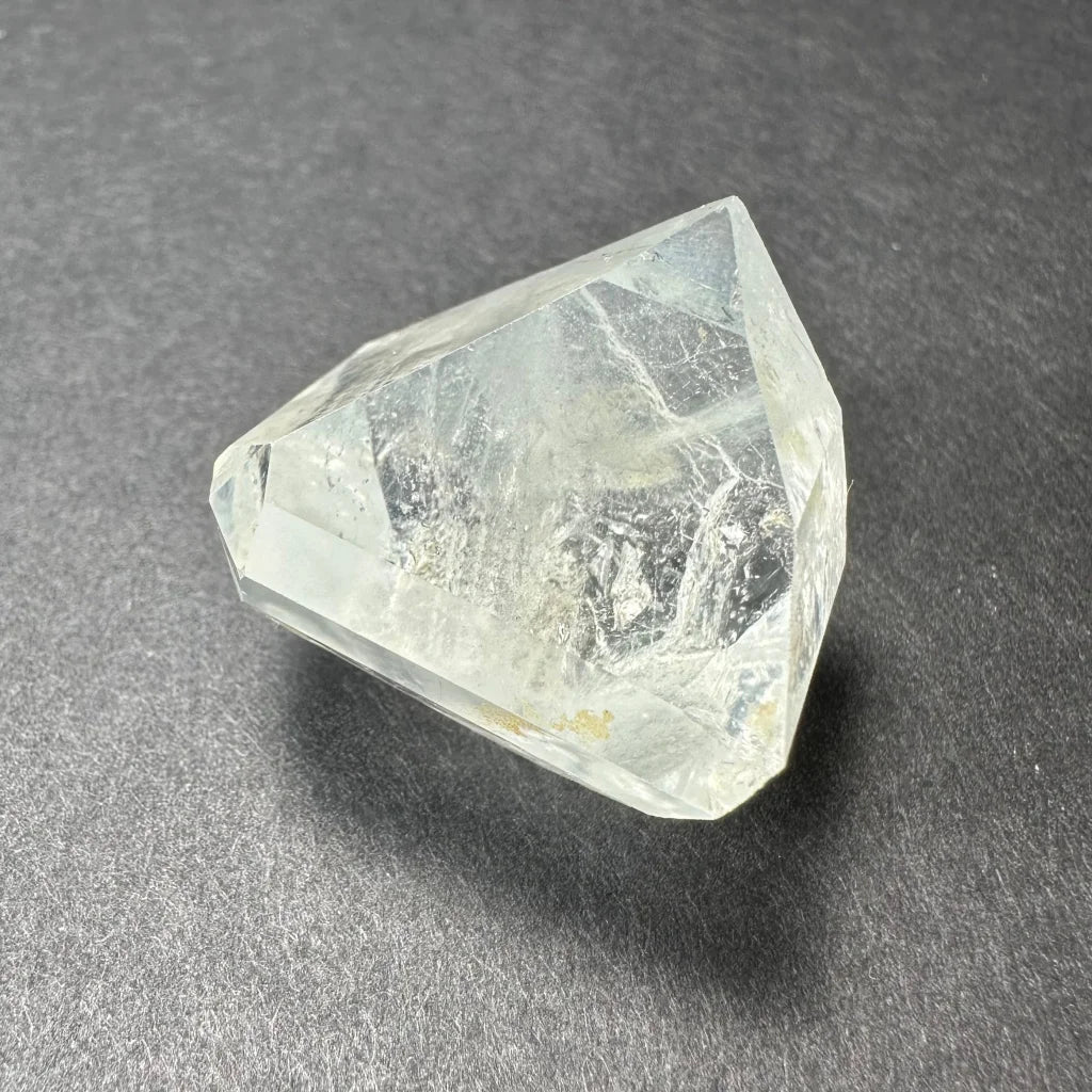 Stunning white topaz crystal from Namibia with golden glow
