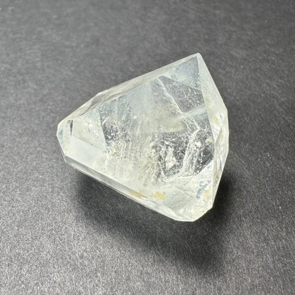 Stunning white topaz crystal from Namibia with golden glow