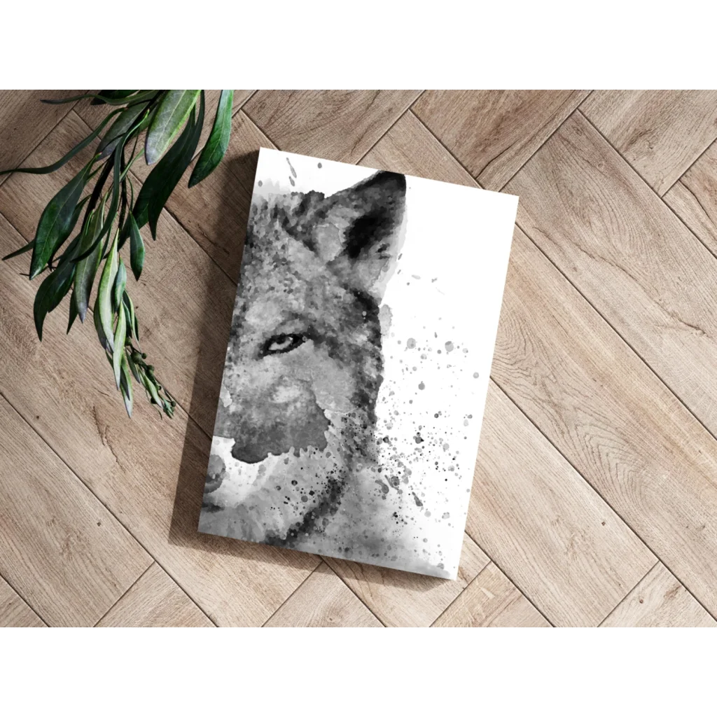 Stunning black and white wolf watercolor canvas art print on wood floor