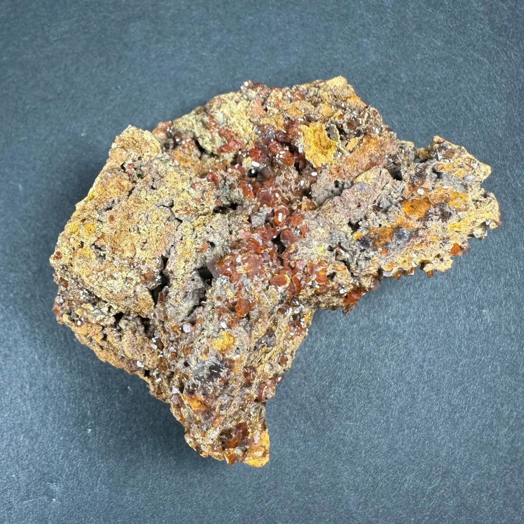 Rugged wulfenite cluster from China’s Maoniuping Mine with brown and yellow hues