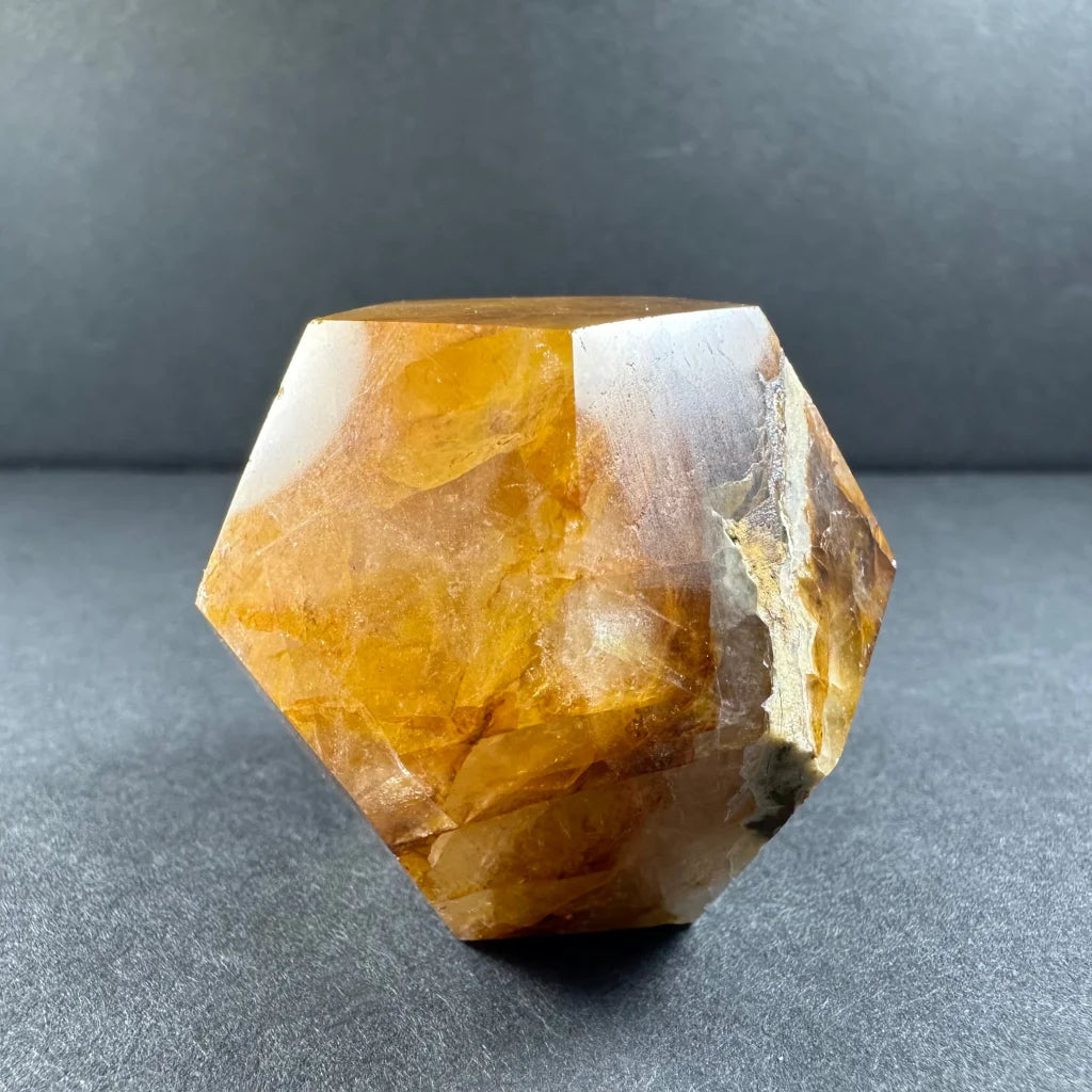 Stunning yellow hematoid quartz dodecahedron carving from Brazil