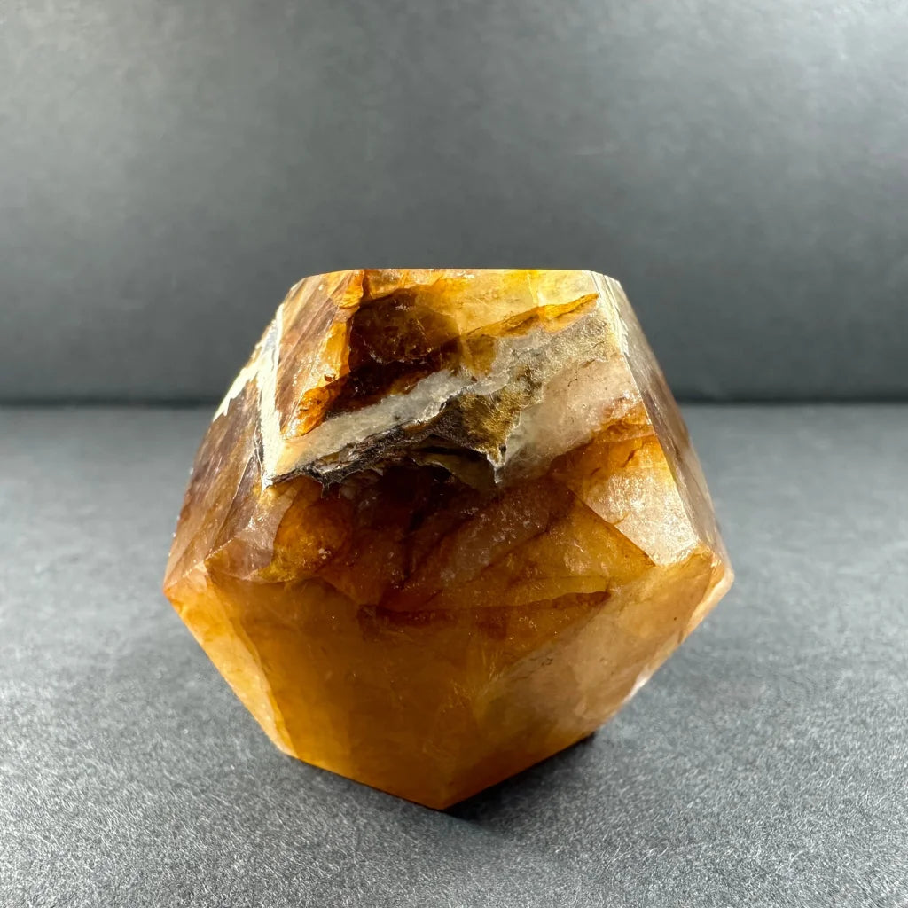 Stunning yellow hematoid quartz dodecahedron carving from Brazil
