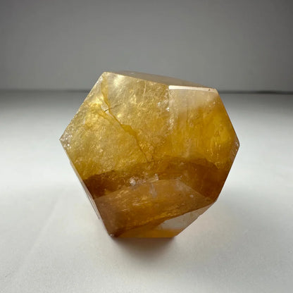 Stunning yellow hematoid quartz dodecahedron carving from Brazil