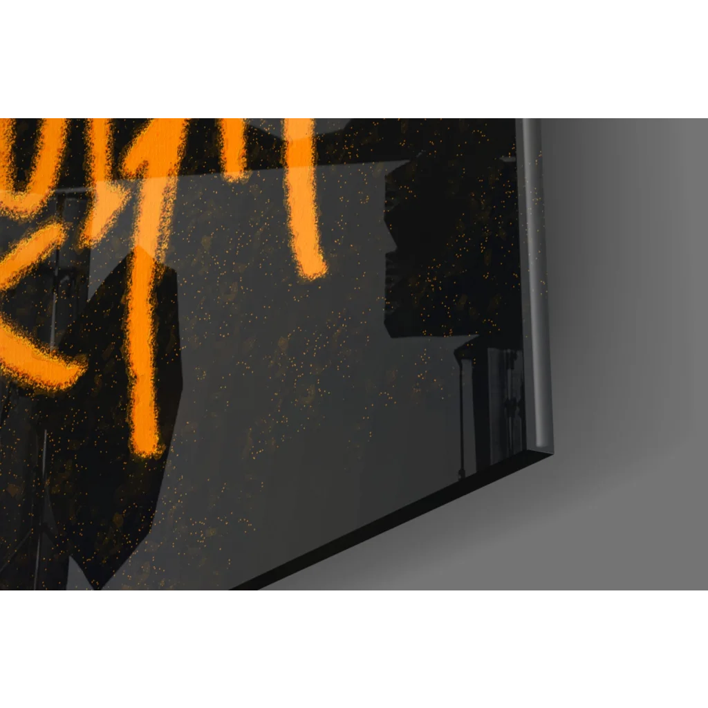 Sleek black-framed glass wall art with bold orange Basquiat graffiti