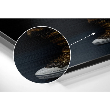 Sleek white sneaker with gold accents on brushed aluminium dibond print