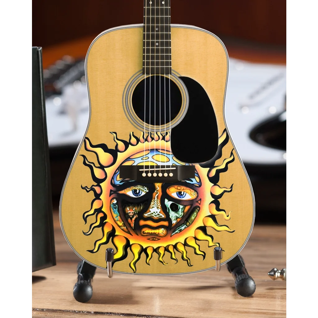 Vibrant sun-themed Axe Heaven® miniature guitar with orange hues and face design