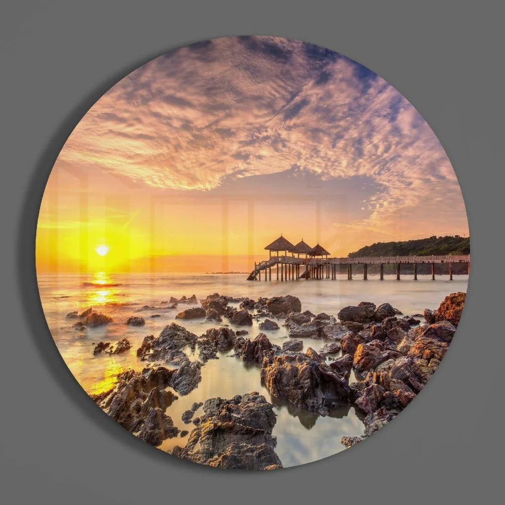 Vibrant sunset tempered glass art of rocky shoreline pier
