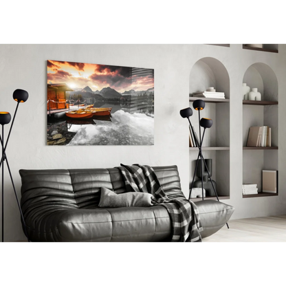 Serene sunset lake boats glass wall art with mountain views