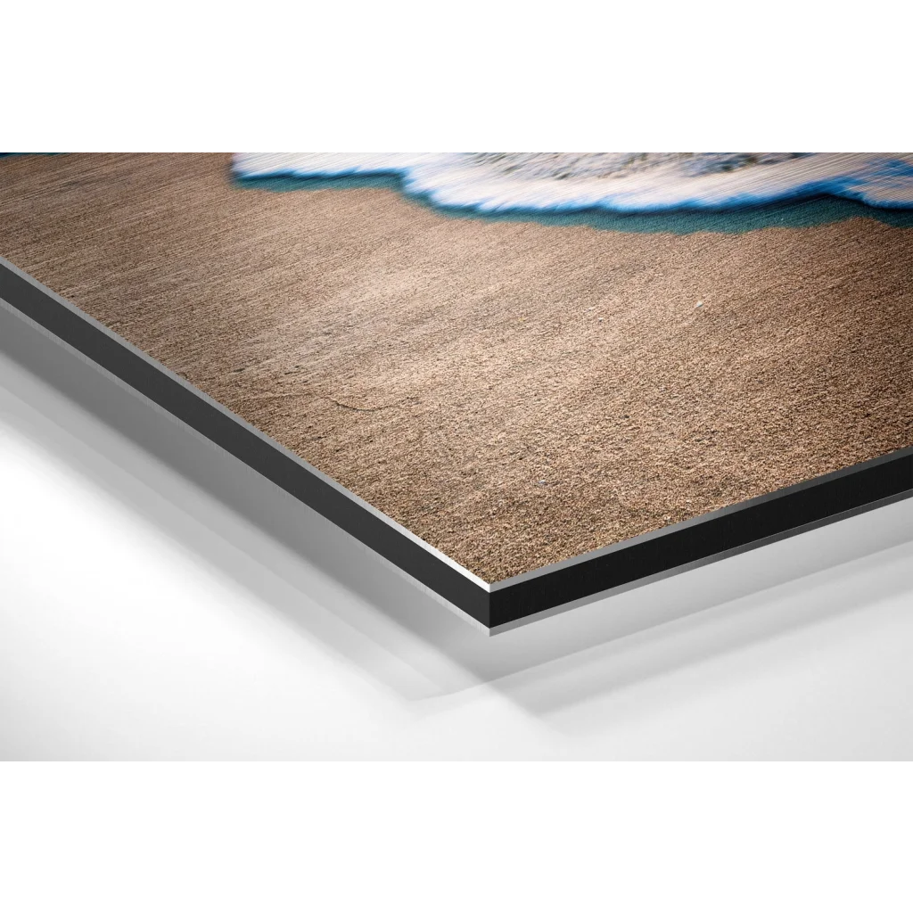 Stunning turquoise ocean wave on beige sand, brushed aluminium dibond print