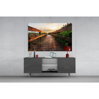 Sunset boardwalk wall art canvas print with golden glow on wet planks