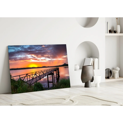 Stunning sunset pier glass wall art over tranquil waters