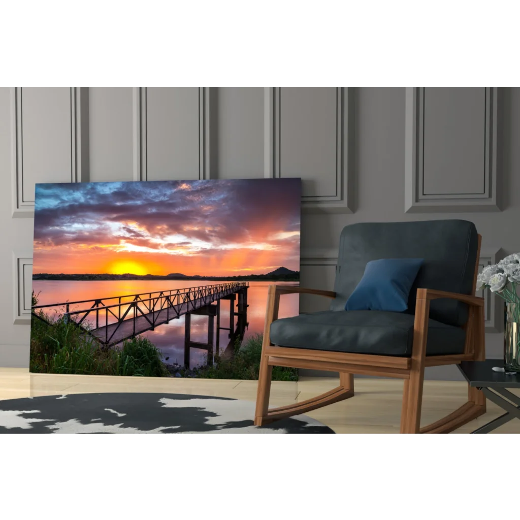 Vibrant sunset glass wall art of wooden pier over tranquil waters