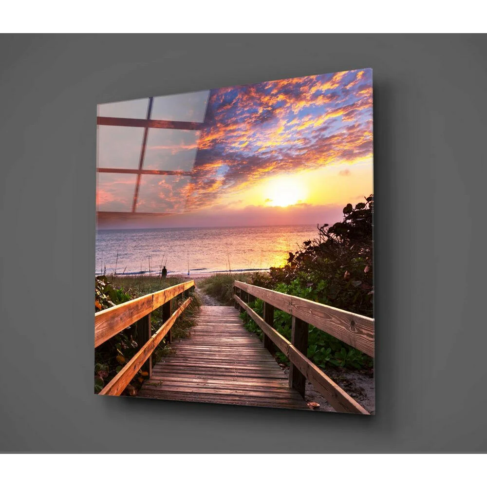 Vibrant sunset beach on sleek transparent glass wall art panel