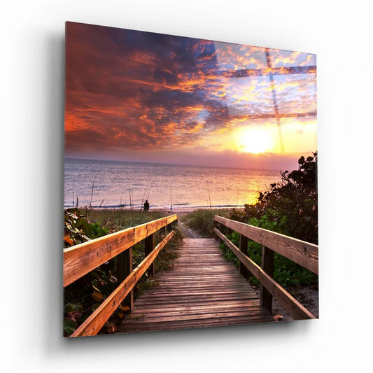 Vibrant sunset boardwalk glass wall art with ocean sky