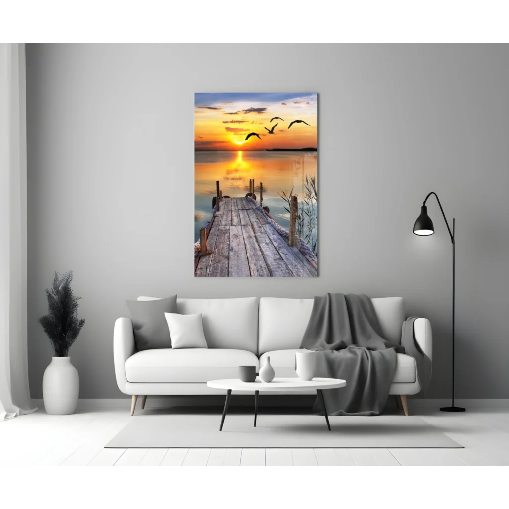 Sunset pier glass wall art with birds flying over calm water
