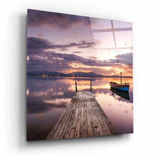 Serene sunset over water on tempered glass art with dock, boat, and size comparison