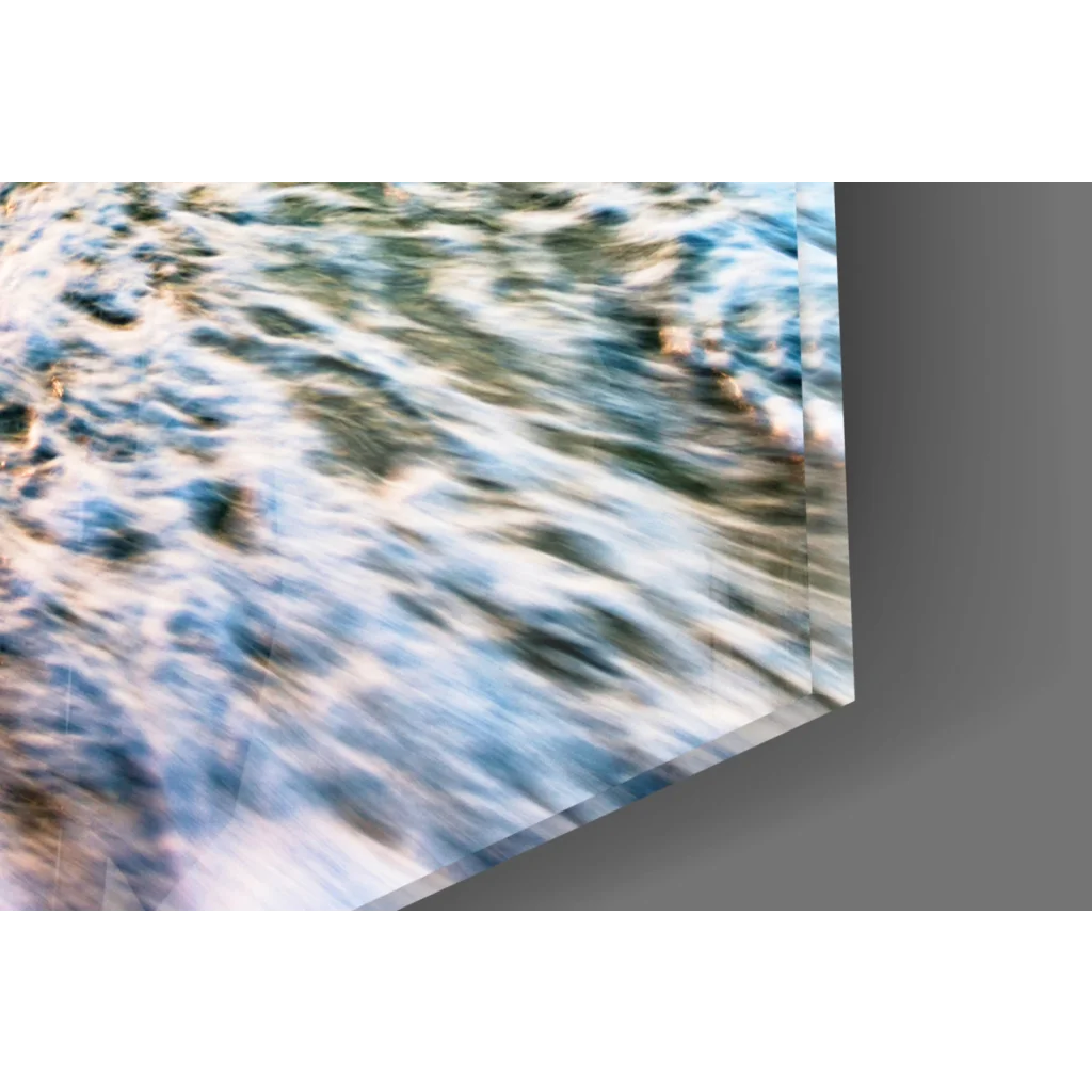 Abstract turquoise sunset beach glass wall art with motion blur on acrylic panel