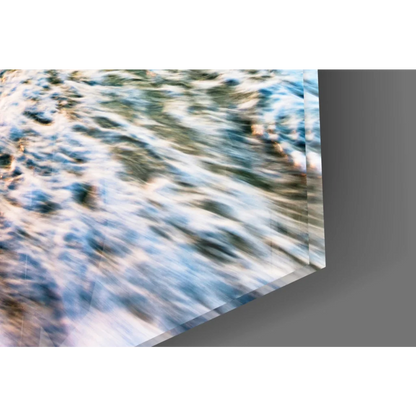 Abstract turquoise sunset beach glass wall art with motion blur on acrylic panel