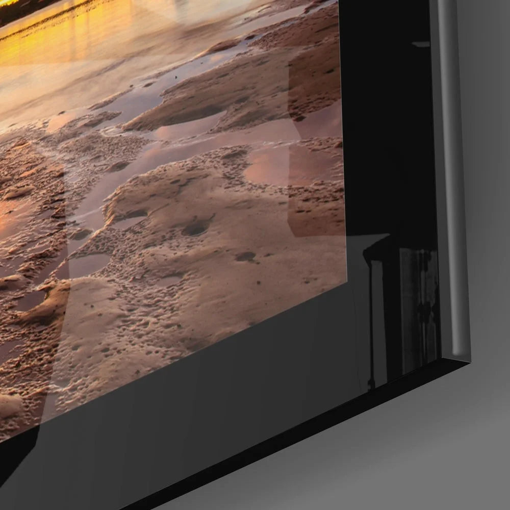 Sleek TV showing vivid sunset beach glass wall art for modern homes