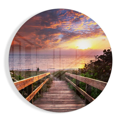 Circular wooden boardwalk to sunset ocean in tempered glass art