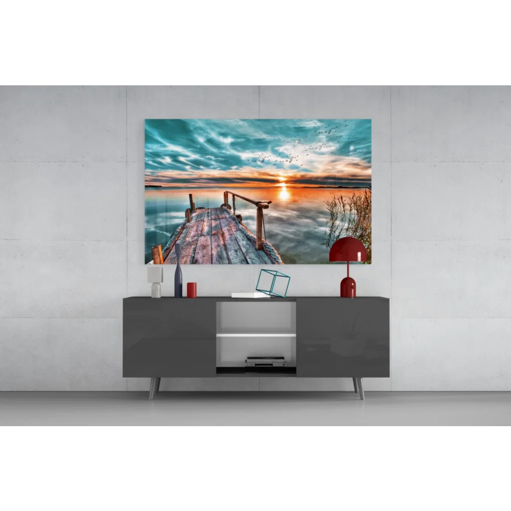 Sunset dock glass wall art with teal orange sky reflection on lake pier