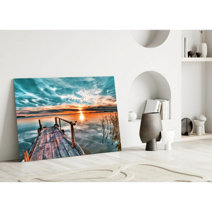 Sunset dock glass wall art with teal orange sky reflection