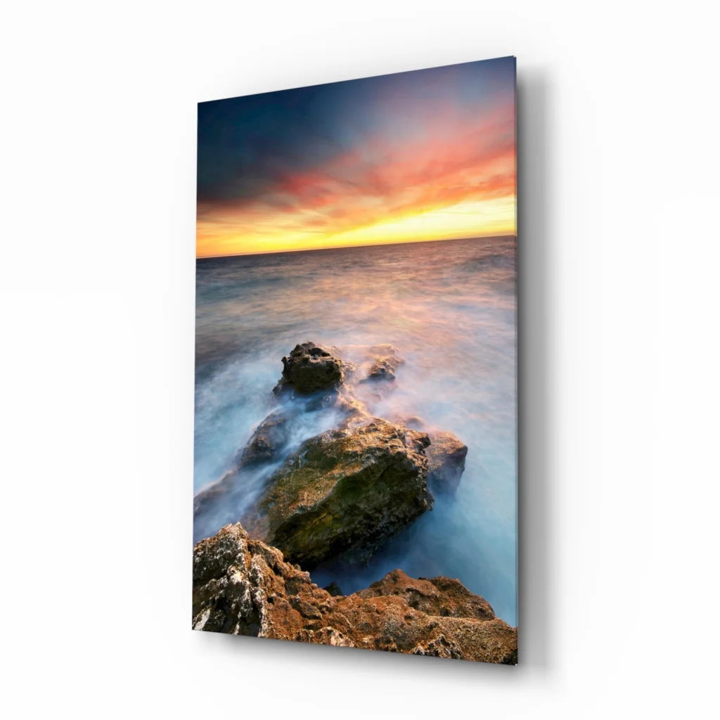 Stunning ocean sunset glass wall art with misty waves on rocks