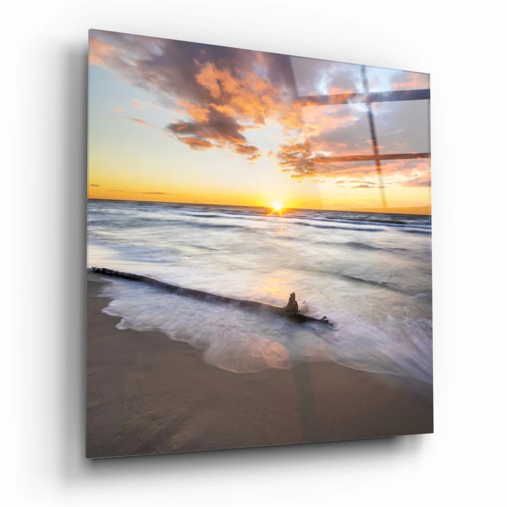 Vibrant sunset over ocean in tempered glass art for walls