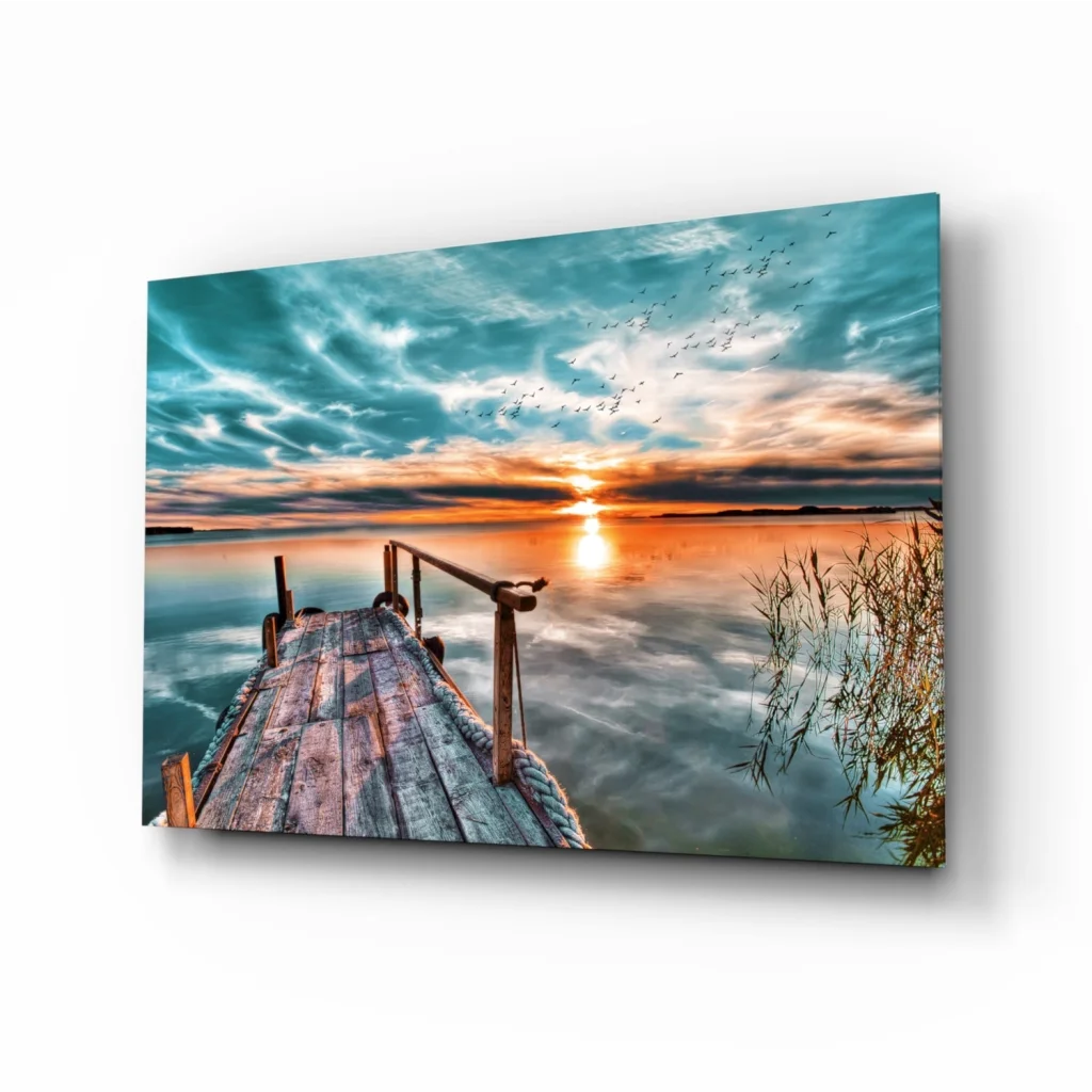 Sunset dock glass wall art with teal orange sky reflection