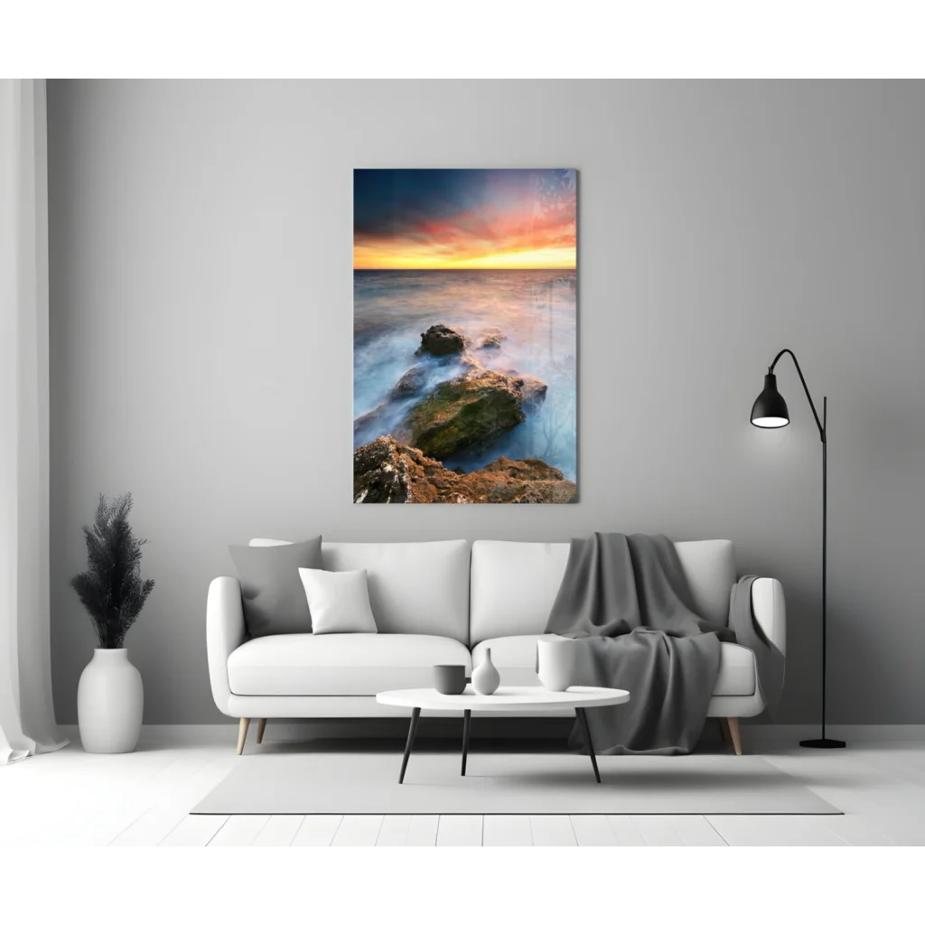 Stunning ocean sunset glass wall art with vibrant hues over calm waters