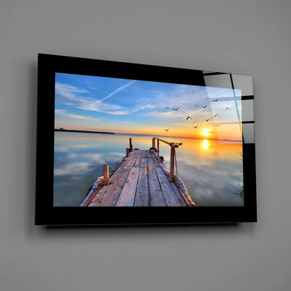 Serene dock sunset glass wall art with golden reflections and birds