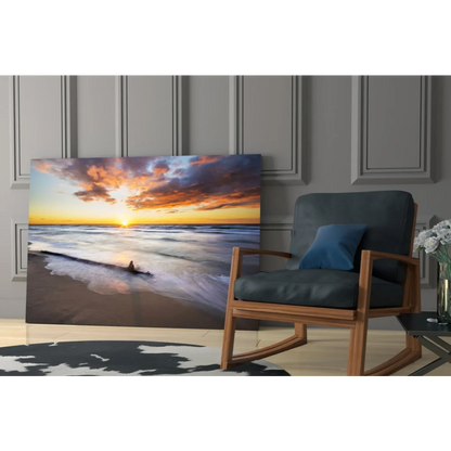 Beige and blue sunset beach glass wall art canvas print on gray wall