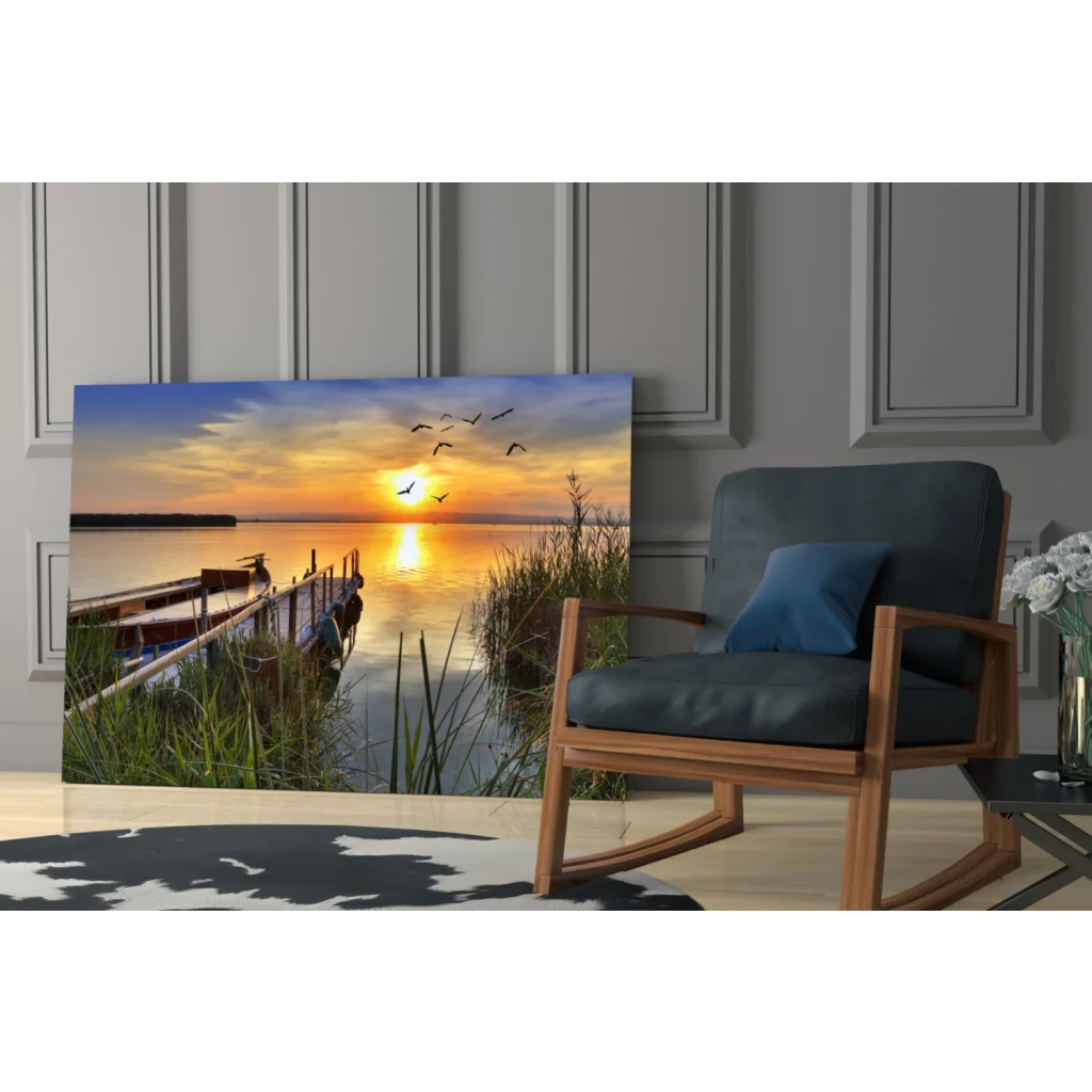 Serene sunset glass wall art with flying birds over water