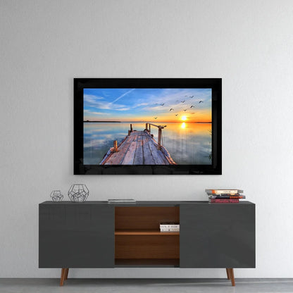 Serene sunset over wooden dock in Misty Mountain Sunrise glass wall art