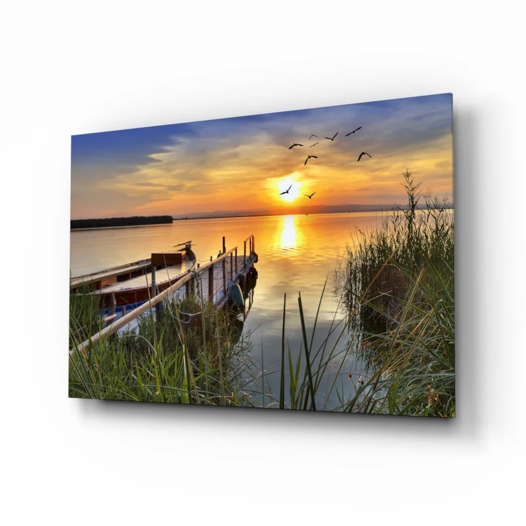 Stunning sunset glass wall art with flying birds over calm water