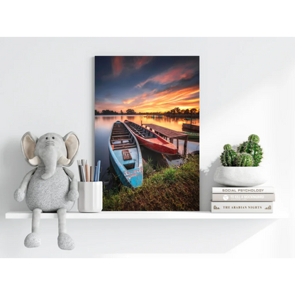 Vibrant Sunset Canoes at the Dock canvas print with blue and red boats