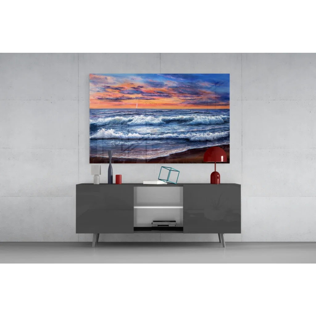 Vibrant sunset ocean waves glass wall art with sailboat and gradient sky