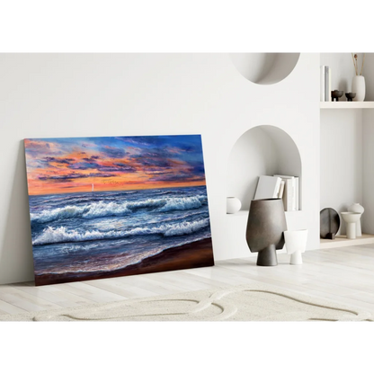Vibrant sunset ocean waves glass wall art with sailboat on white wall
