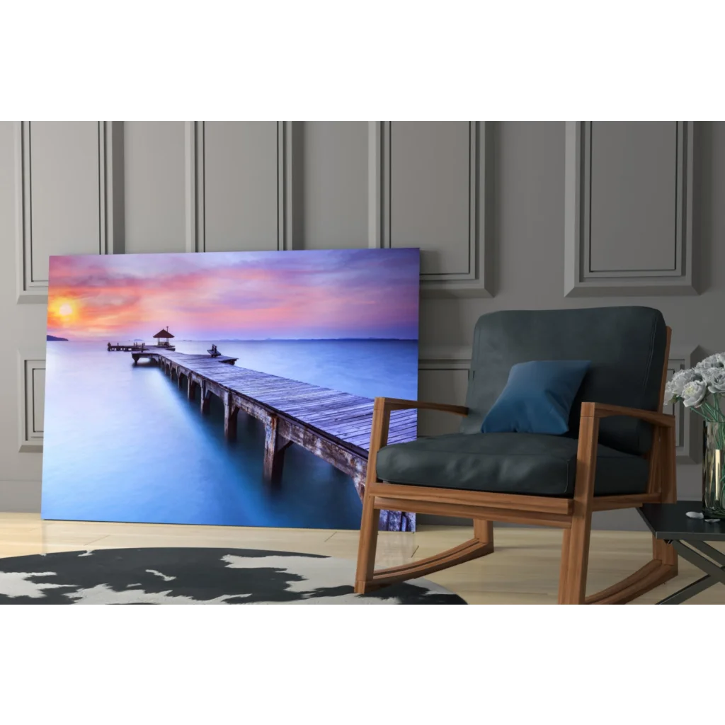 Serene sunset pier on canvas wall art with vibrant orange purple sky